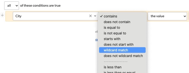 Filter on a report builder, where you select a field, then a search operator, and then type a value. The search operator list is a dropdown that contains wildcard match.